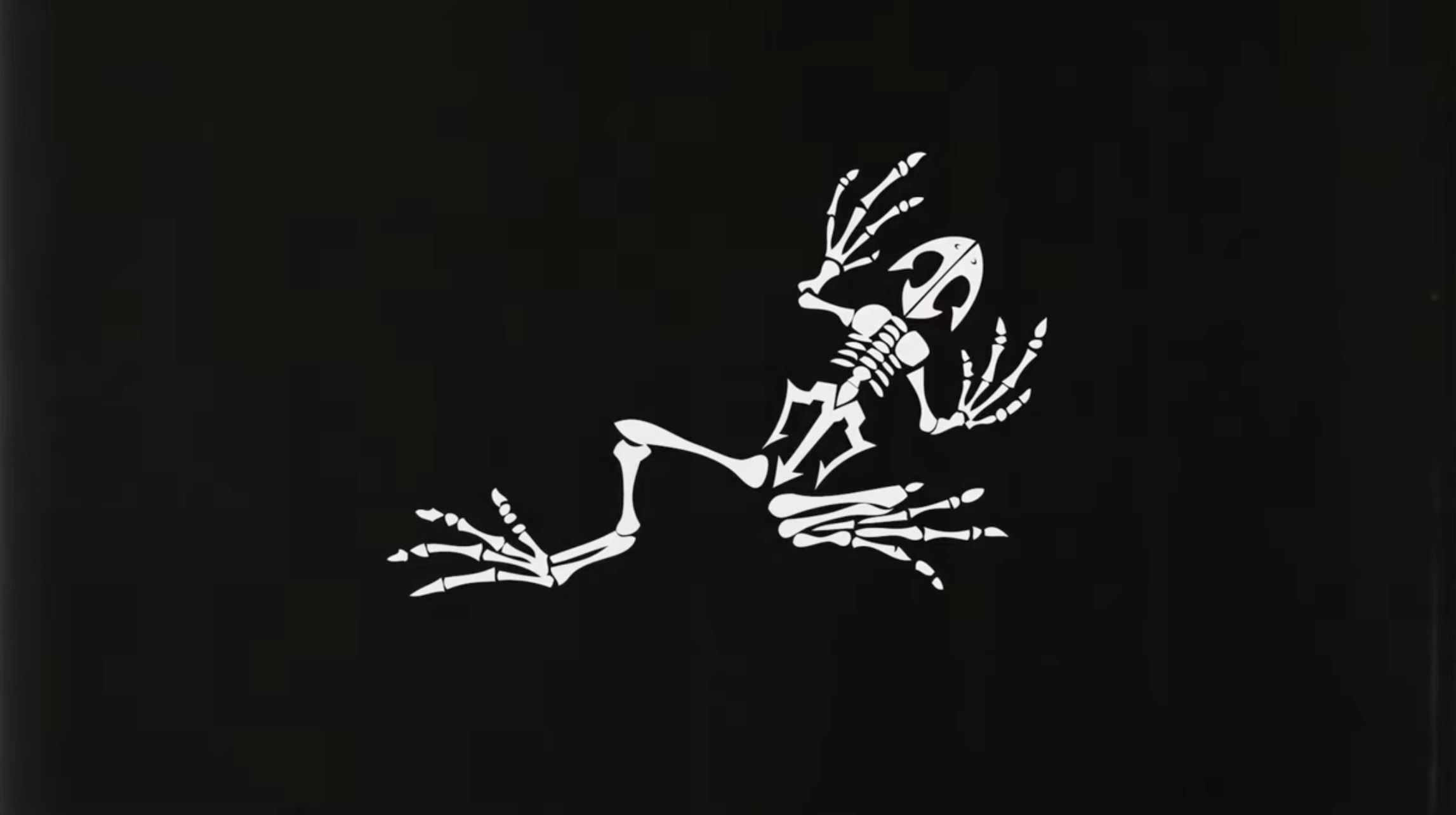 The Bone Frog, the skeletal frog symbol honoring fallen Navy SEALs, in white on a black background.
