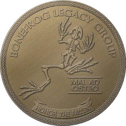 Bronze coin with skeleton frog design and text 'Bonefrog Legacy Group' on a white background