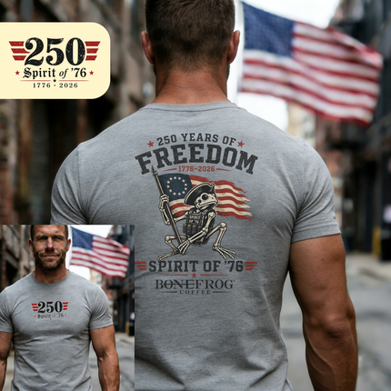 Man wearing a gray t-shirt with '250 Years of Freedom' design, featuring an American flag and skeleton holding a rifle.